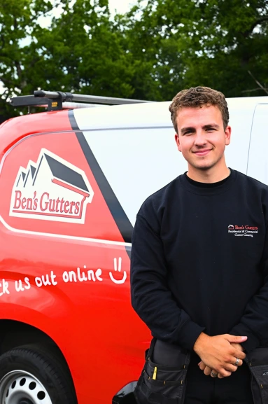 our gutter cleaner in Wales standing by company vehicle